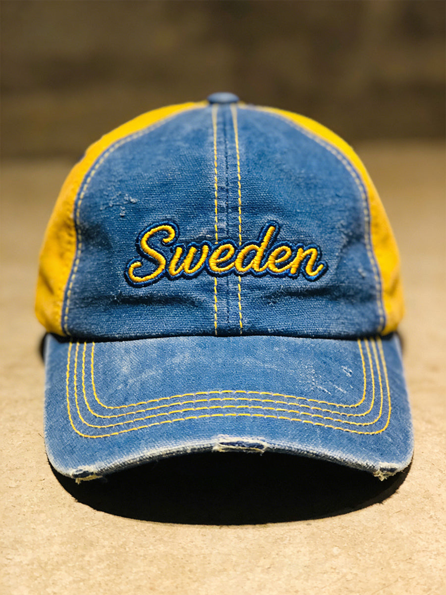 Beprydd hatt med färgblockerad print