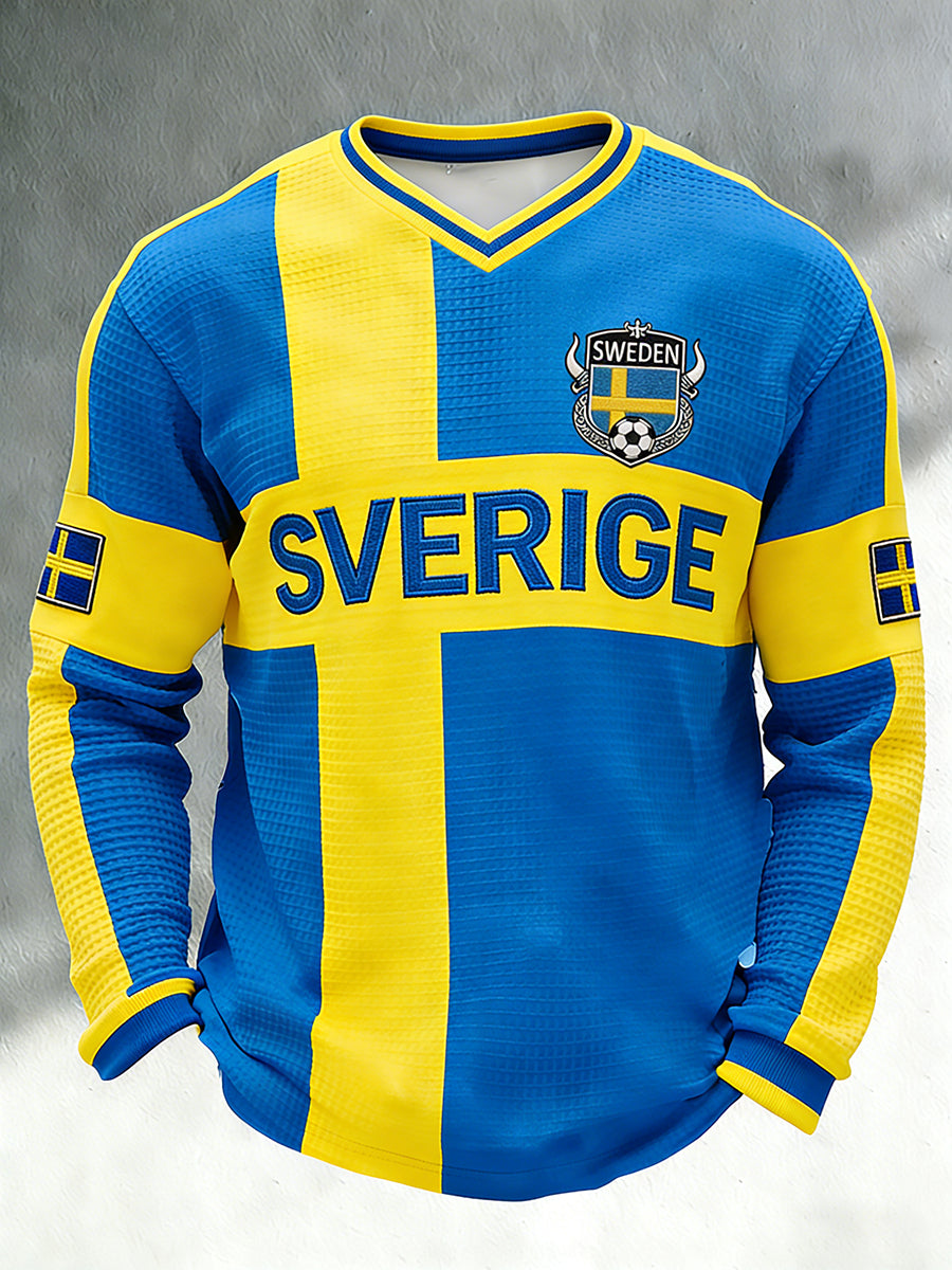 Herrtröja i waffelstickat tyg med fotbollsmotiv, färgblockad design, v-ringning och långa ärmar