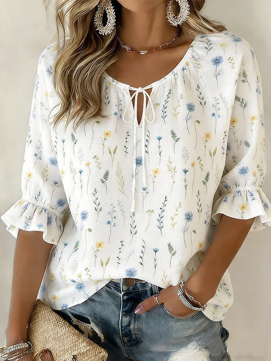 Dams skjorta i casual och elegant stil med blommönster och halvlånga ärmar