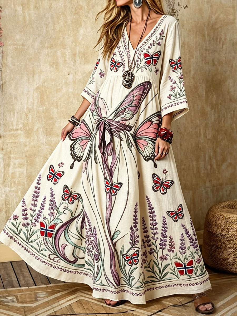 Damekjole i skandinavisk stil med nordisk blomstermotiv trykt på linstofg