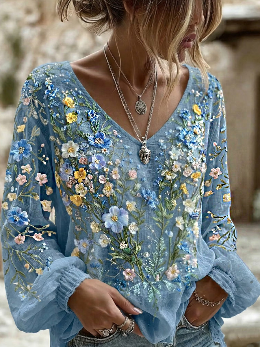 Kvinnlig avslappnad, bekväm linneblus med vintageartprint i blommor