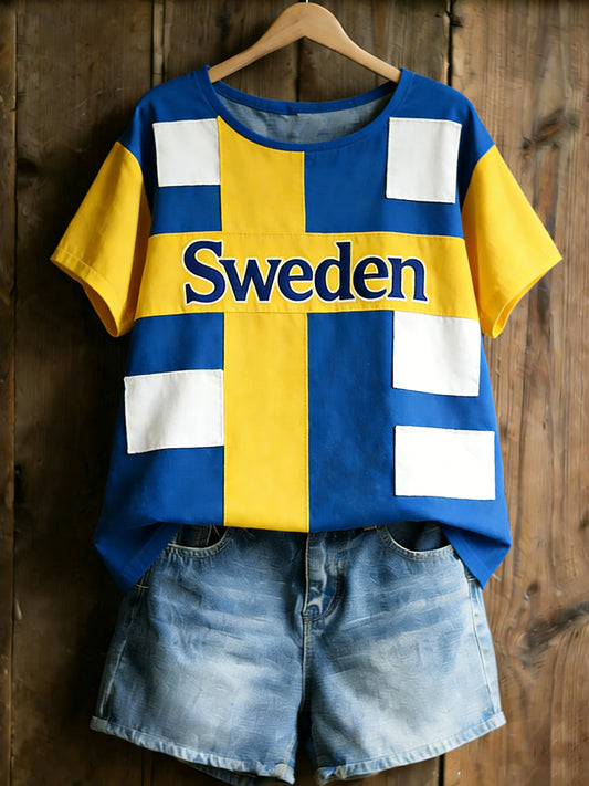 Dame T-skjorte med kunsttrykk med svensk dalahest-tema