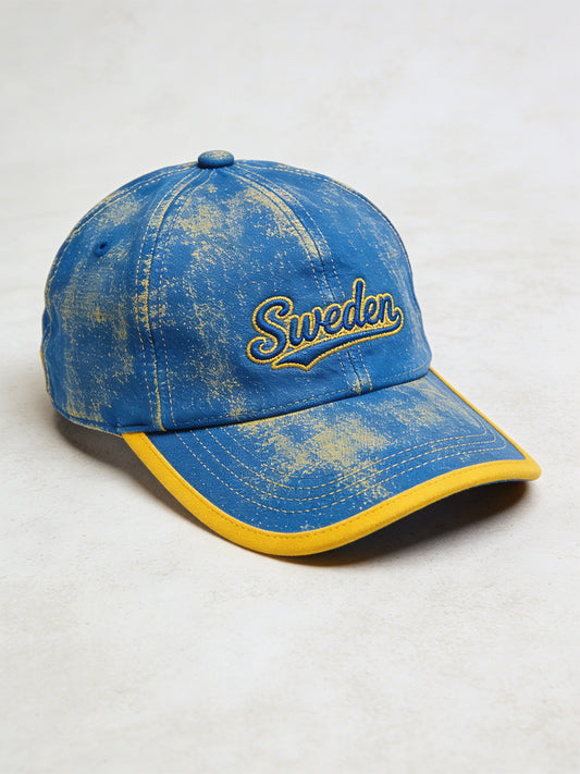 Beprydd hatt med färgblockerad print