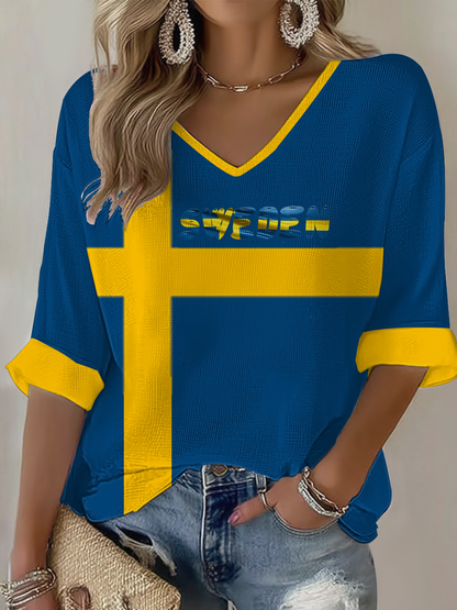 Damskjorta i våffeltyg med svensk flagga