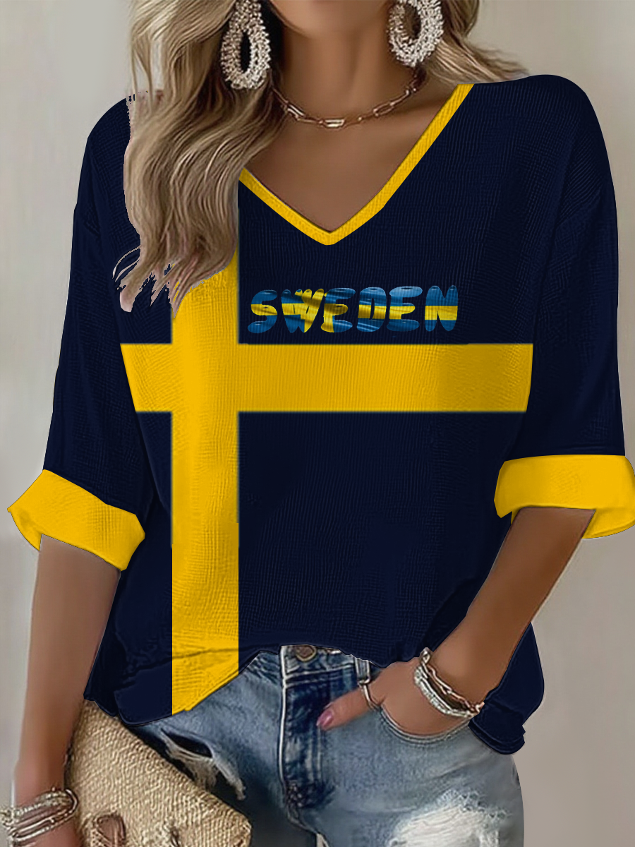 Damskjorta i våffeltyg med svensk flagga