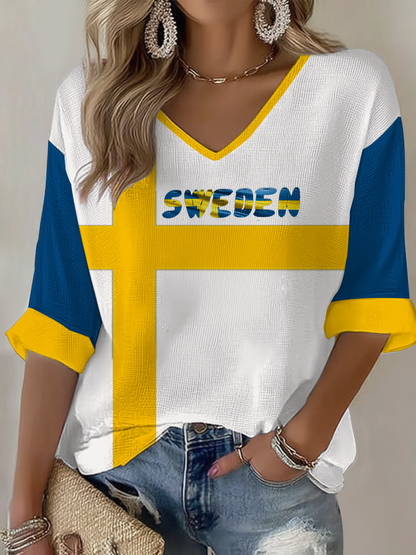 Damskjorta i våffeltyg med svensk flagga