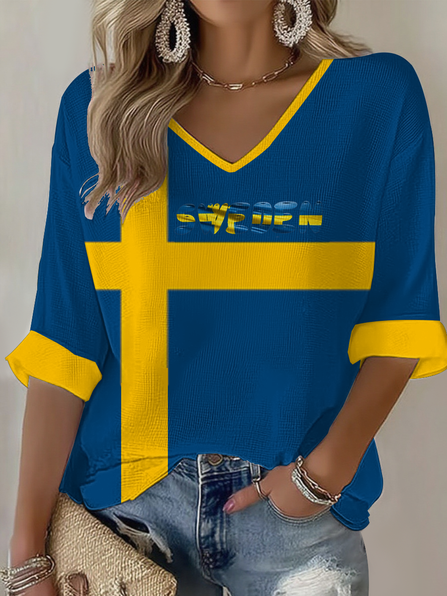 Damskjorta i våffeltyg med svensk flagga