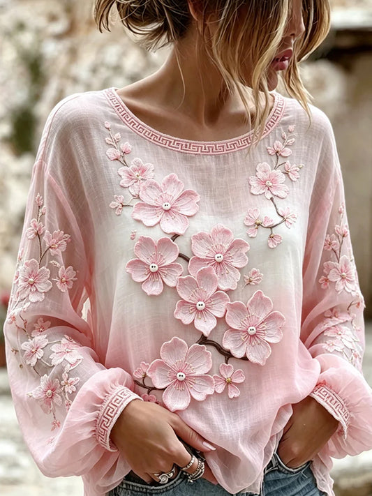 Dameskjorte i vintagestil i bomull og lin med broderte blomster og trykt patchwork
