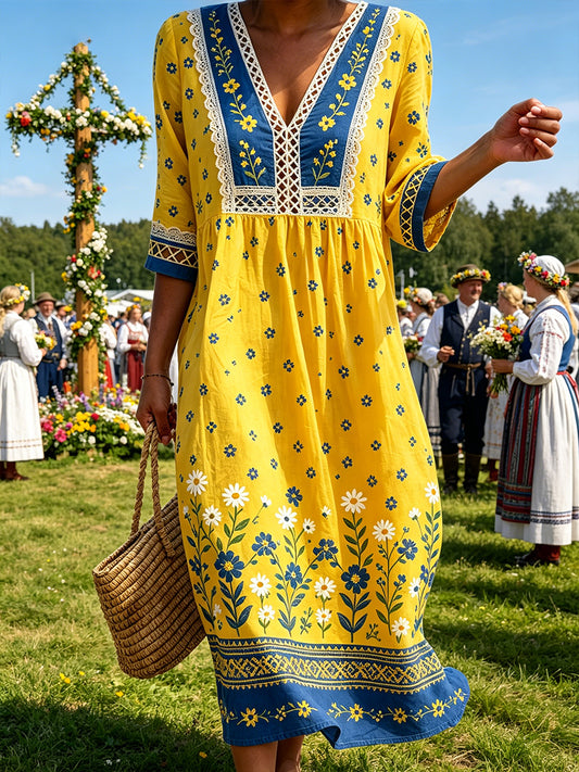 Kvinnlig ledig klänning med tryck på temat midsommarfest