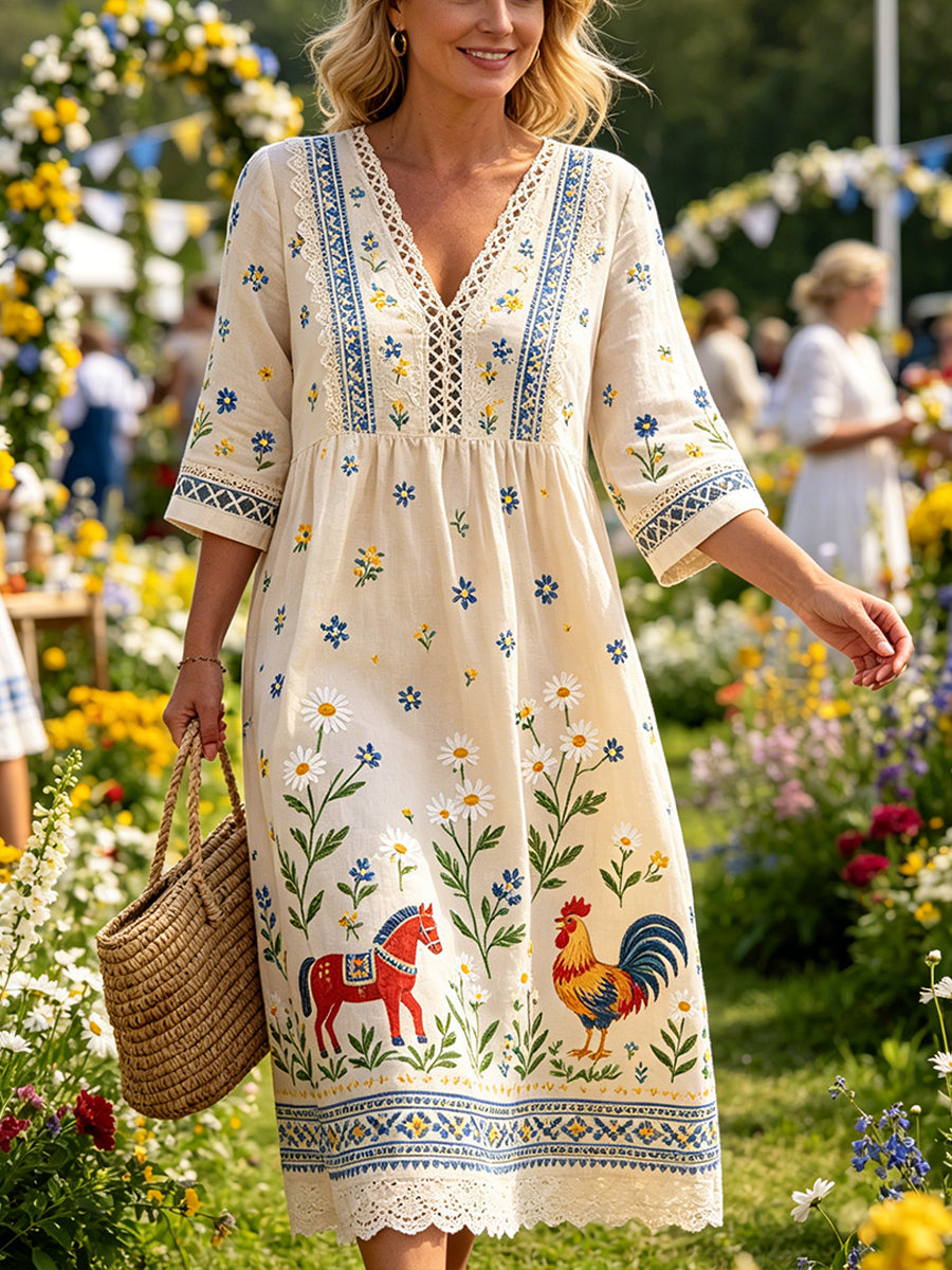 Kvinnlig ledig klänning med tryck på temat midsommarfest