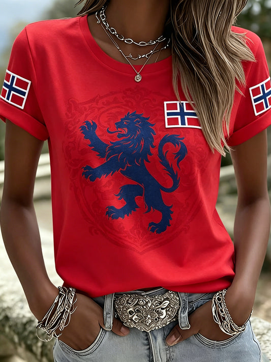 Dametopp med kunsttrykk for å heie på en norsk fotballkamp
