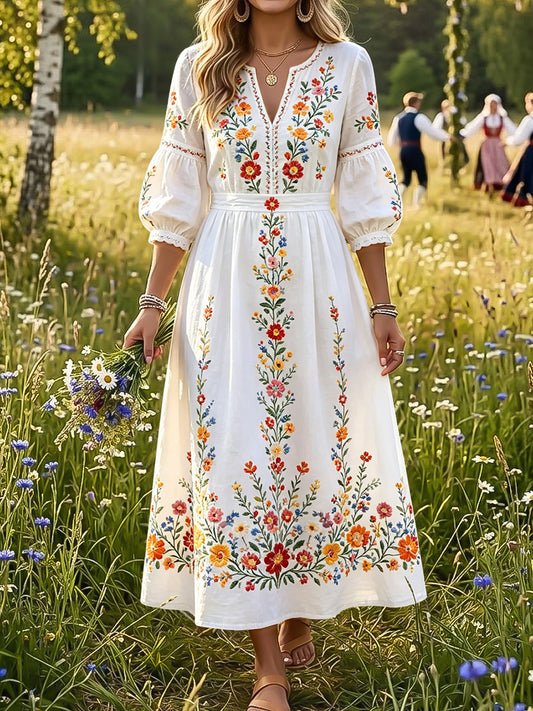 Kjole i vintage-stil til dame med blomstermønster og v-hals