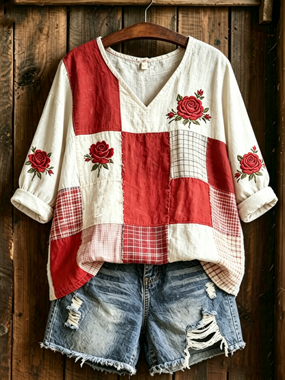 Dammens blommönstrad midjelångärmad t-shirt med V-ringning