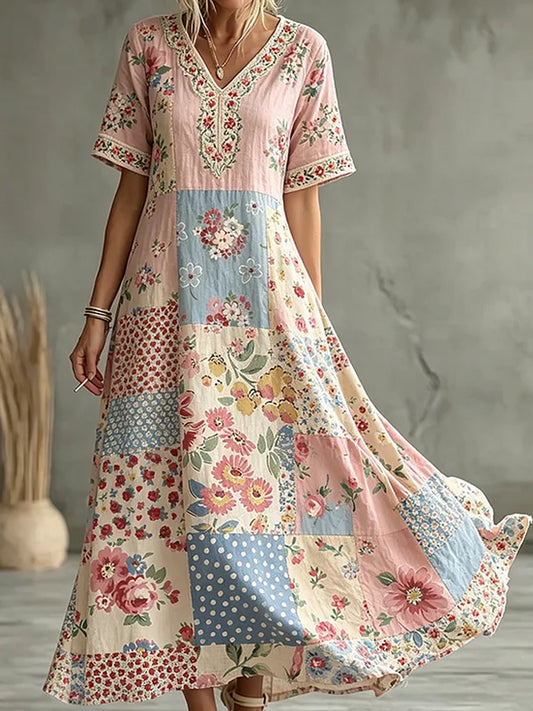 Dameskjorte i bohemsk stil med blomsterbroderi, rund hals og korte ermer, midilengde