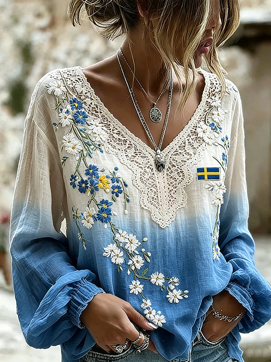 Dame-midtsommertopp i linimitasjon med blomstermønster og lange ermer