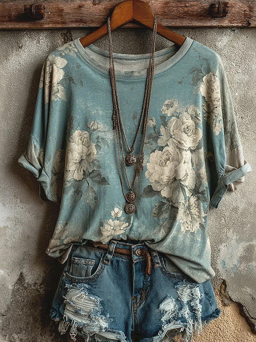 Damsvintag t-shirt med blommigt konsttryck och bekväm passform