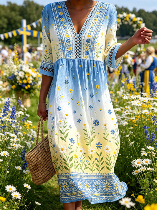 Dame midtsommerkjole med blomstermønster og ombré-effekt samt V-hals