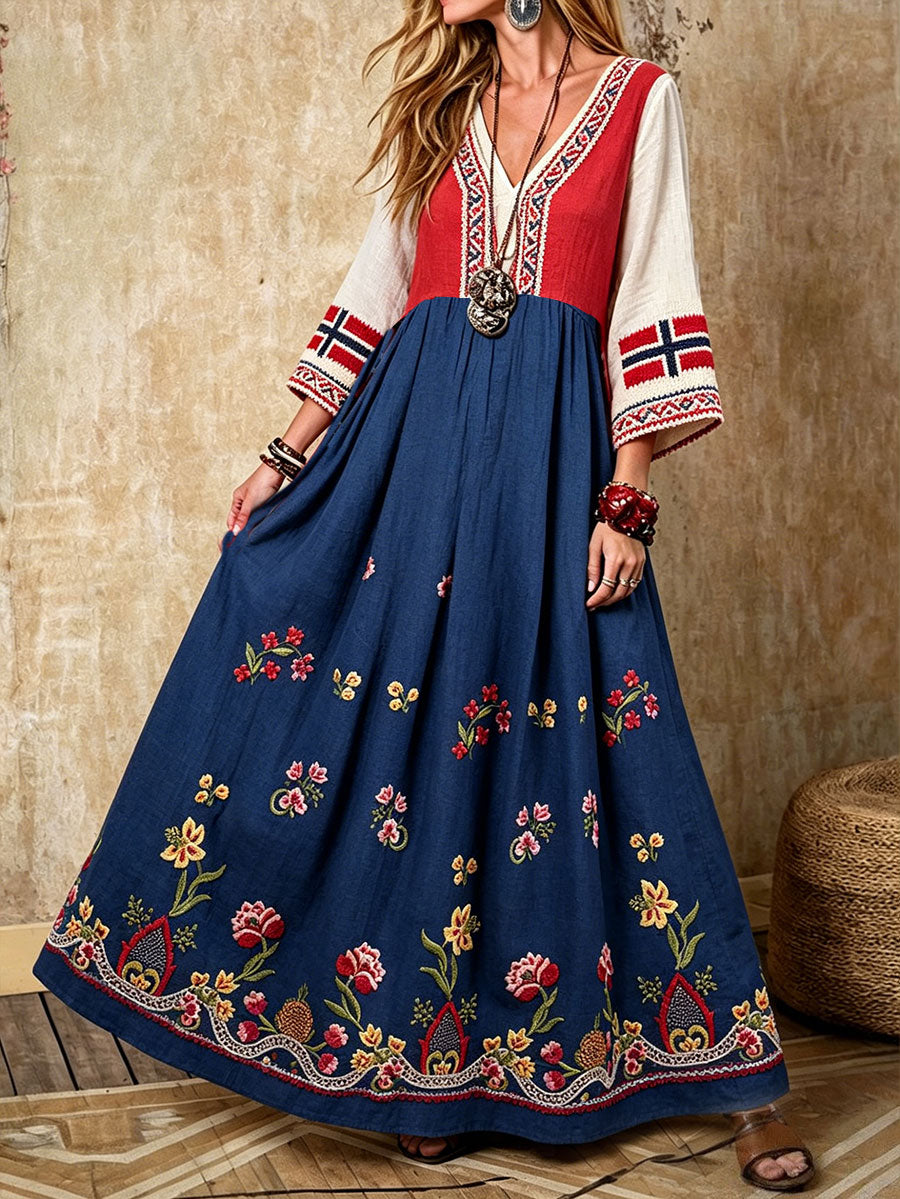 Damekjole i nordisk skandinavisk stil med blomstermotiv trykt på lin