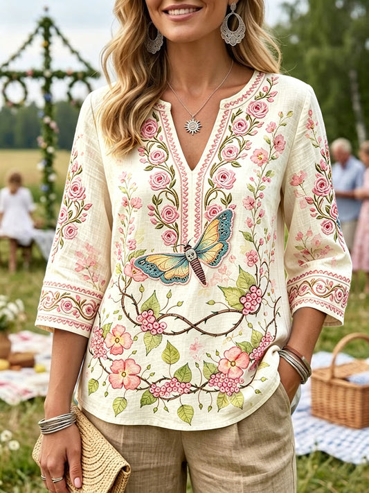Dame off-white t-skjorte i bomull-lin med svensk rosebroderi og V-hals, avslappet stil