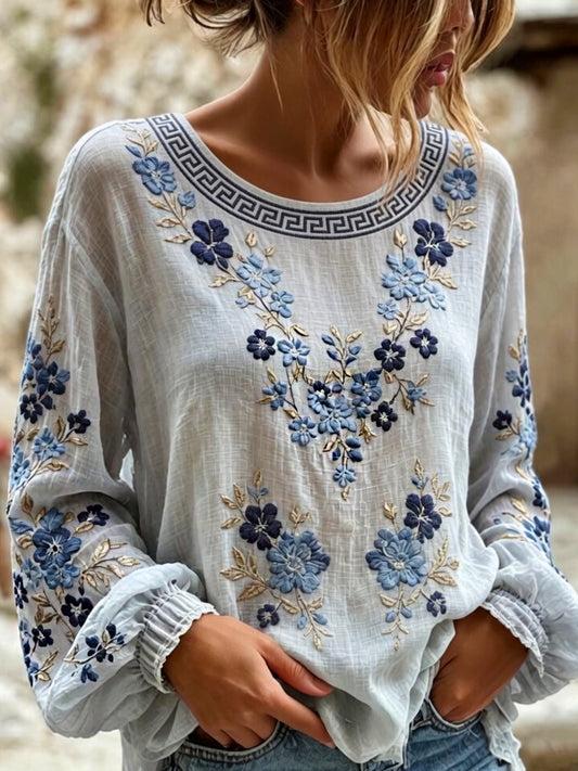 Damegenser i vintagestil med blomstret kunsttrykk, laget av bomull og lin