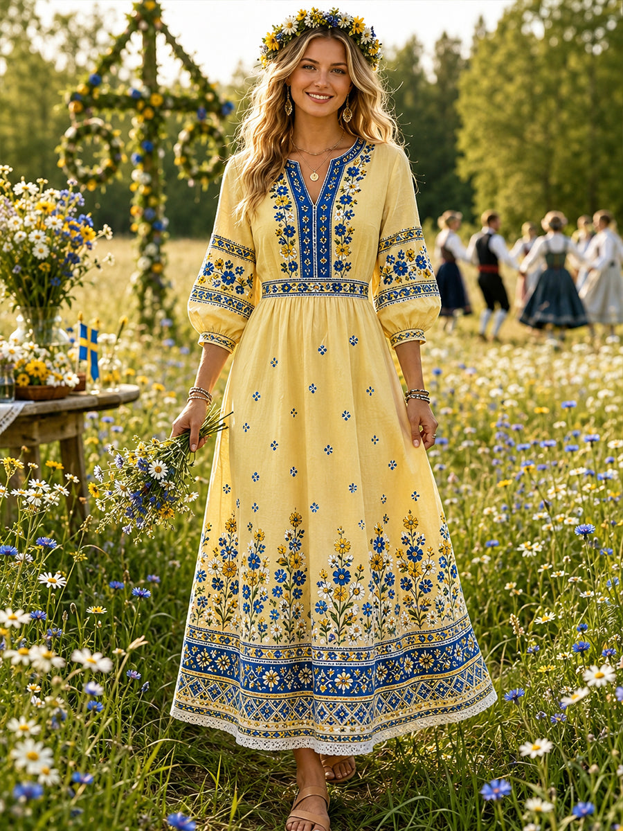 Dammens midsommarklänning med blommönster och v-ringning