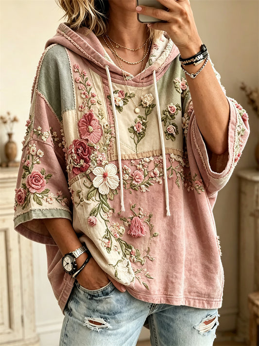 Damvintertröja i vintagestil med rosa rosor och blommönstrad färgblockdesign, halvlånga ärmar och oversize-huva