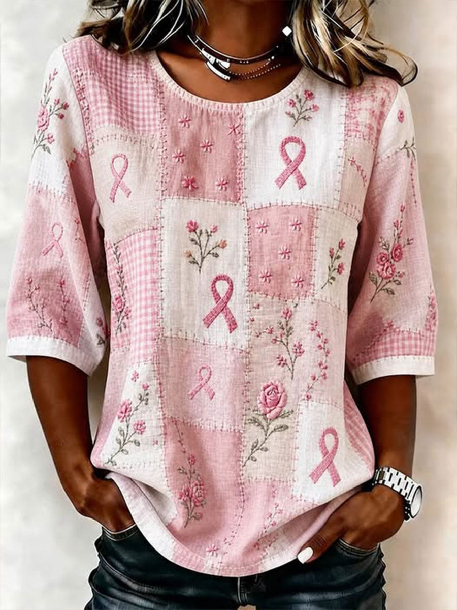 Kvinnlig t-shirt med tryckt budskap om bröstcancer och avslappnad stil