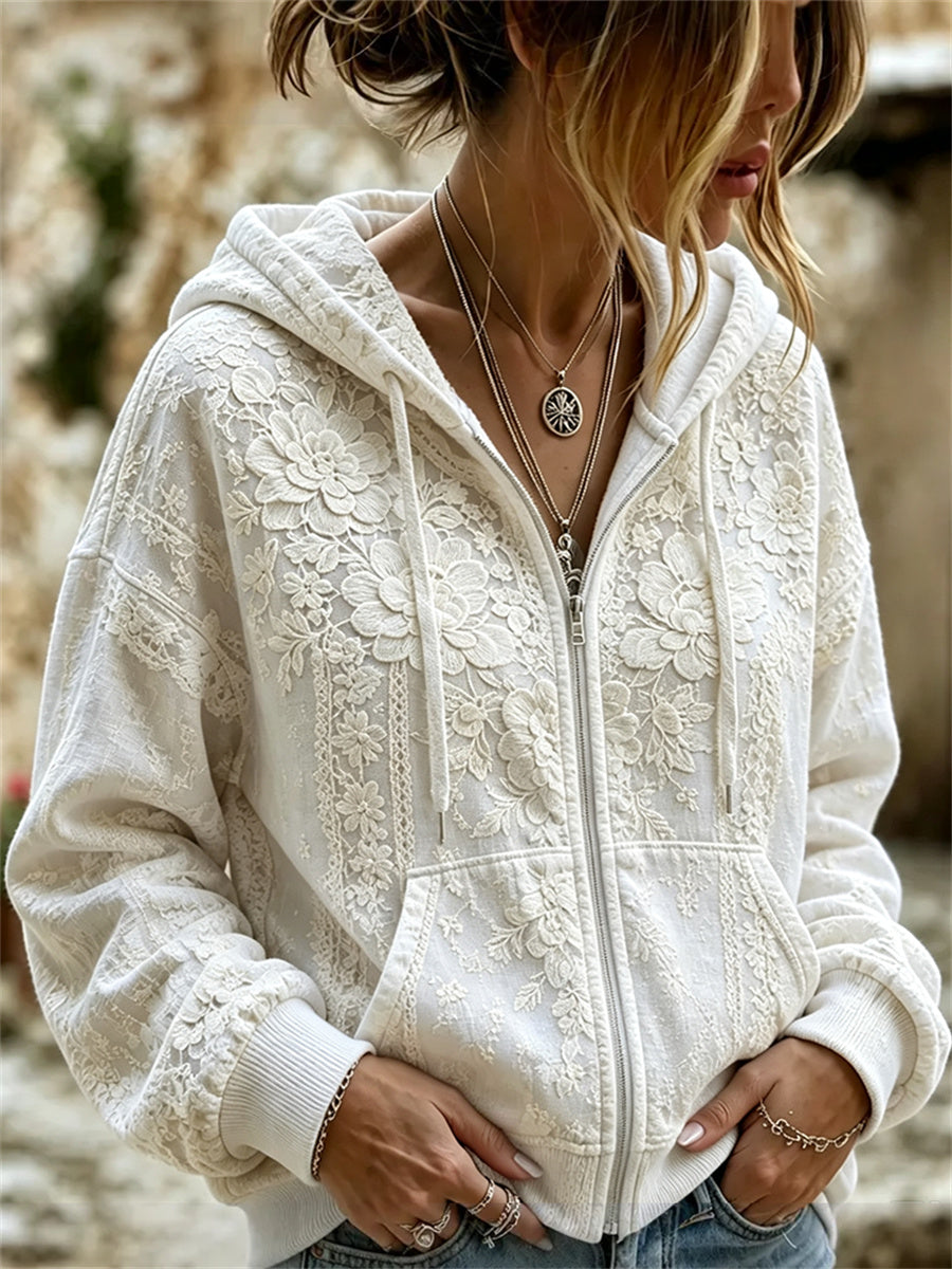Damsvart, klassiskt boho-hoodie med vit blomsterkonsttryck och full dragkedja
