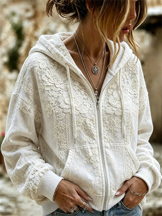 Damsvart, klassiskt boho-hoodie med vit blomsterkonsttryck och full dragkedja