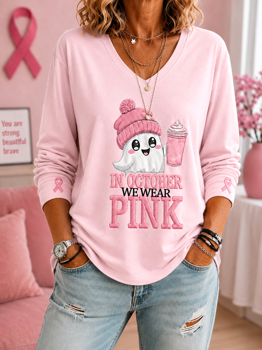 Kvinnors oktoberklädsel – Halloween-t-shirt i rosa med spöktryck, bröstcancermedvetandeband och V-ringning samt lång ärm